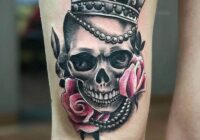 Man Upper Leg Tattoo